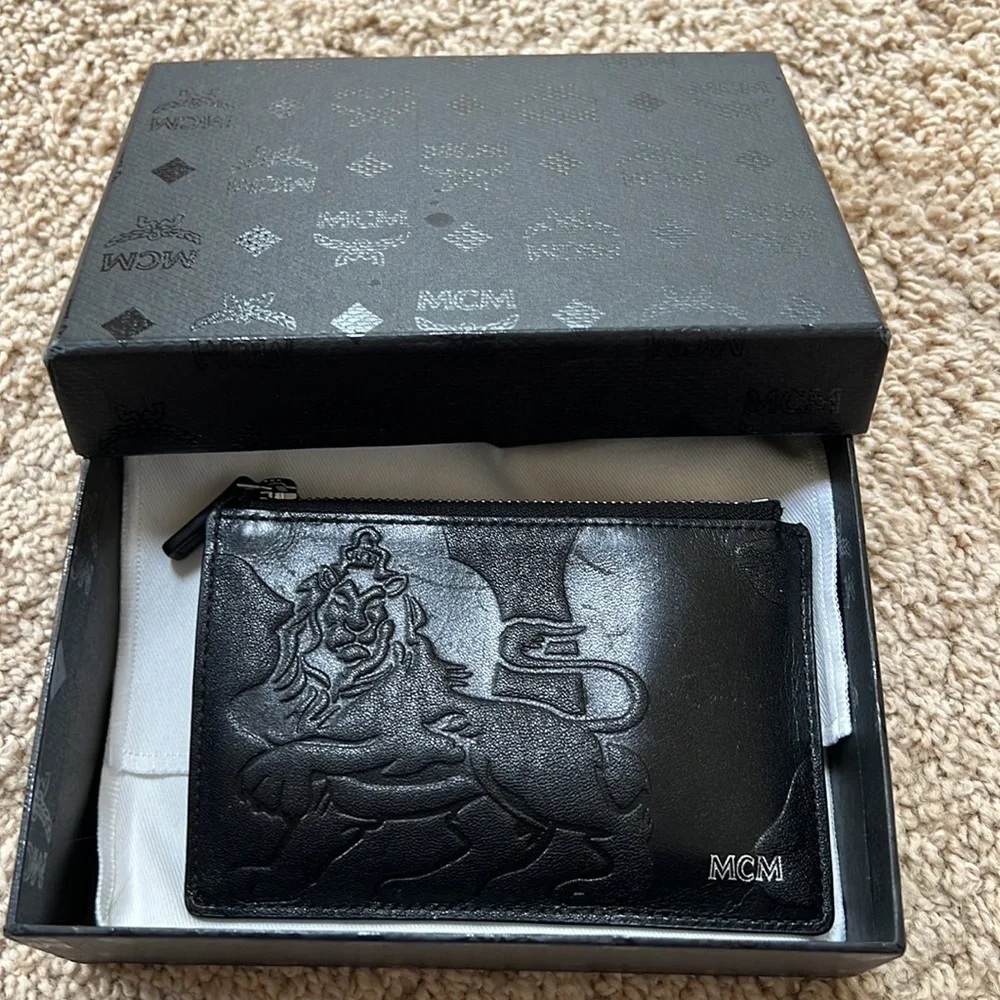 MCM men's lion embossed black with blue and grey mini zipped coin card holder
